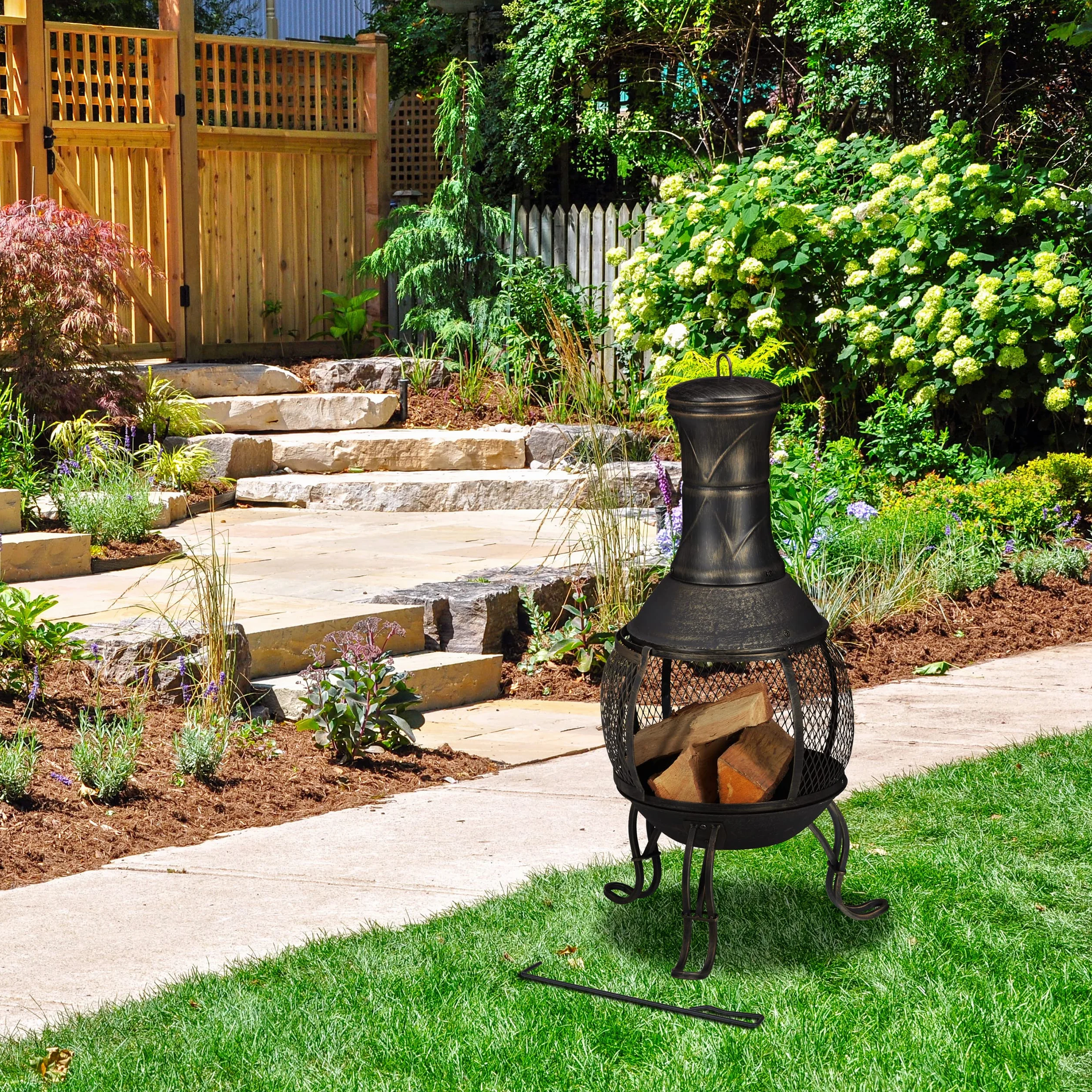 Relaxdays Terrassenofen, Stahl & Gusseisen, HxD: 88x36 cm, Gartenkamin Funkenschutz, Chiminea, Aztekenofen, schwarz/Gold